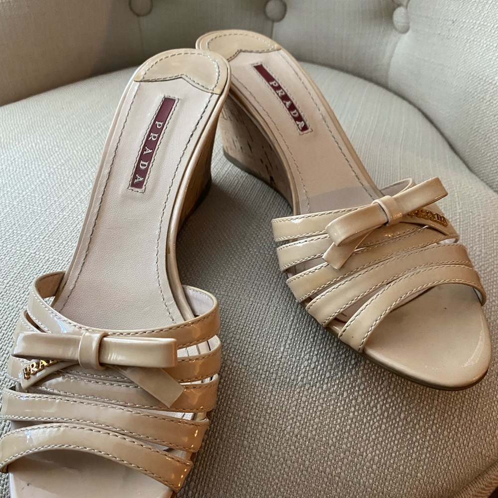 Authentic Prada wedge slip ons